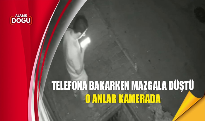 Telefona bakarken mazgala düştü: O anlar kamerada